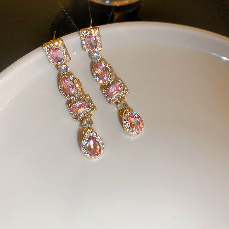 Boucles d'oreilles fleur avec perle et strass