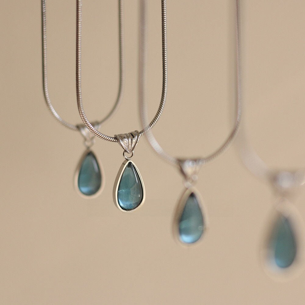 Collier pendentif goutte d'eau rétro français en acier titane