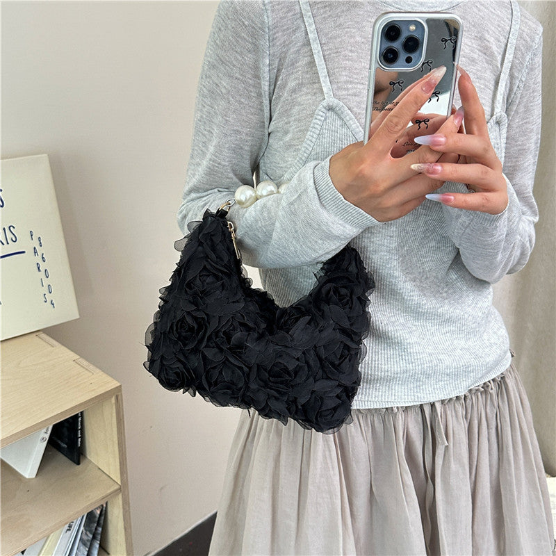 Sac à main élégant à texture perle