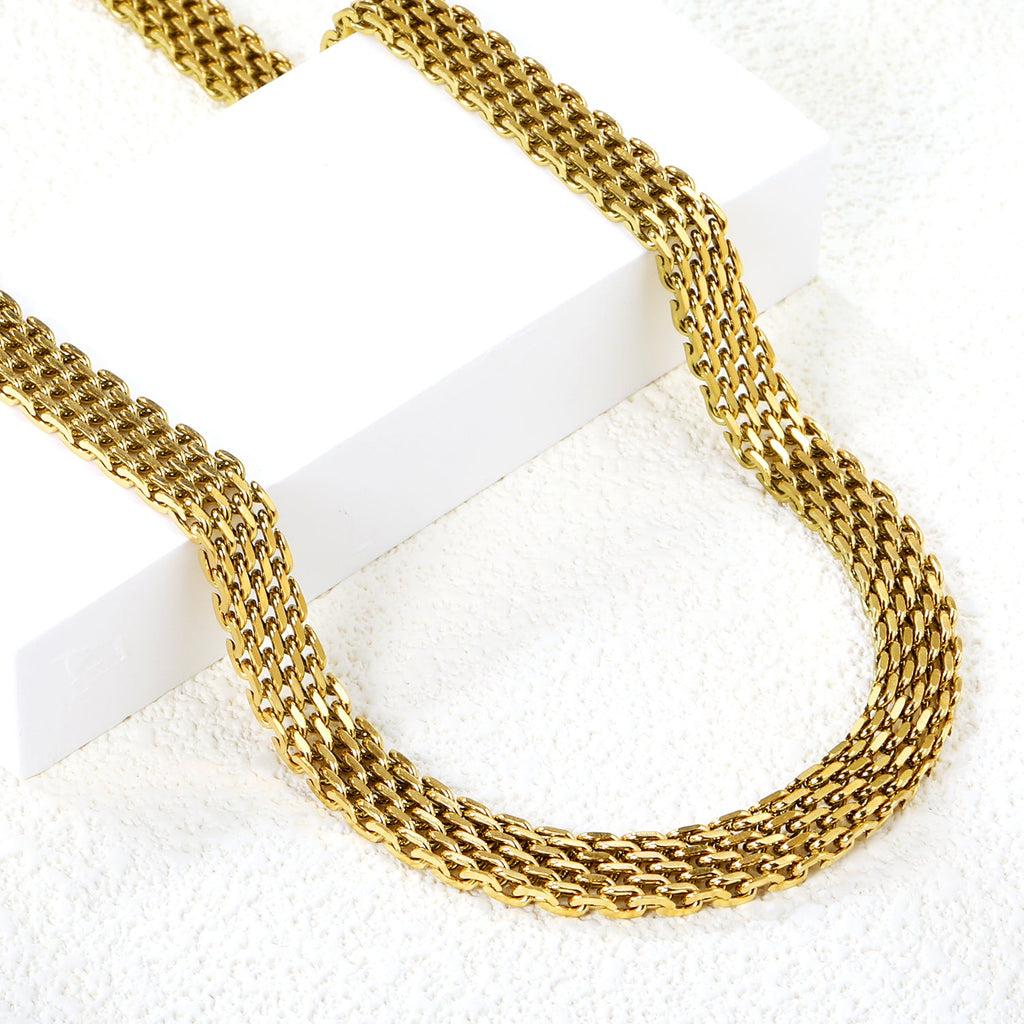 Collier chaîne tressée à breloque