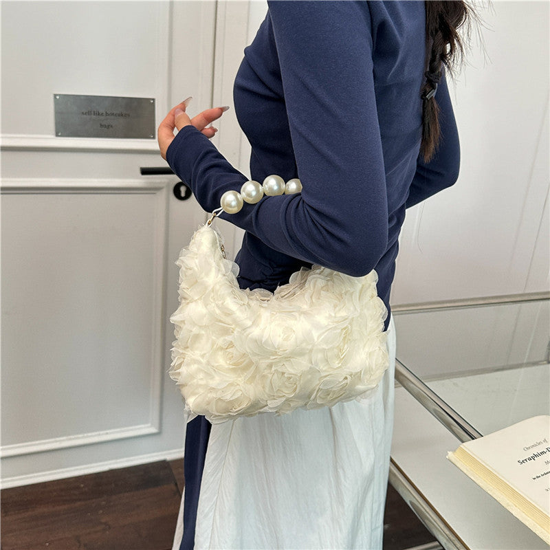 Sac à main élégant à texture perle