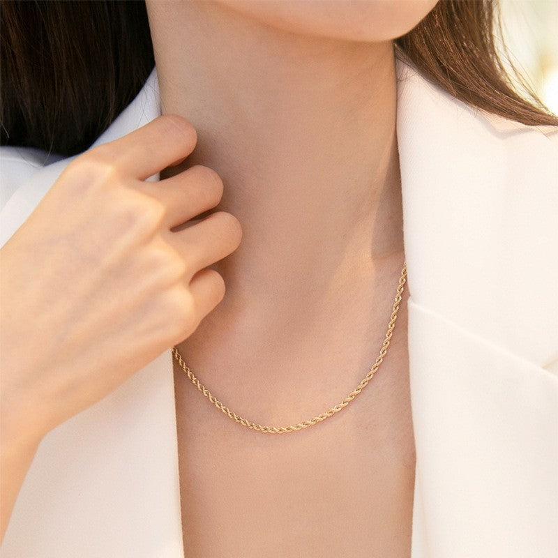 Collier chaîne torsadée dorée