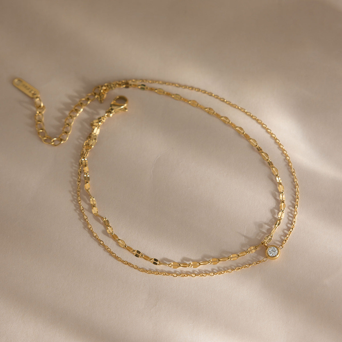 Bracelet de cheville double couche en acier inoxydable et zircons