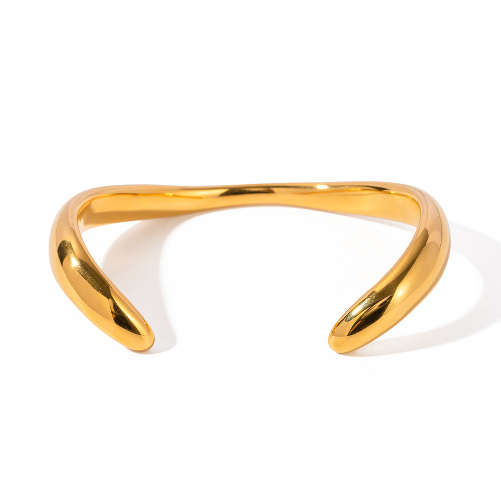 Bracelet ouvert de luxe en acier titane avec perle