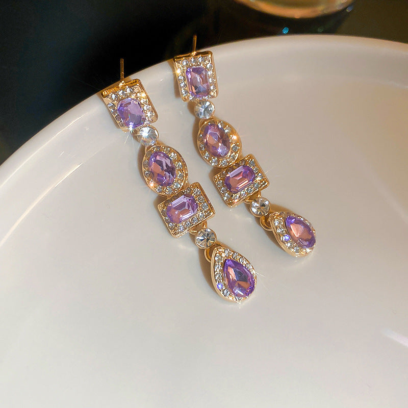 Boucles d'oreilles fleur avec perle et strass