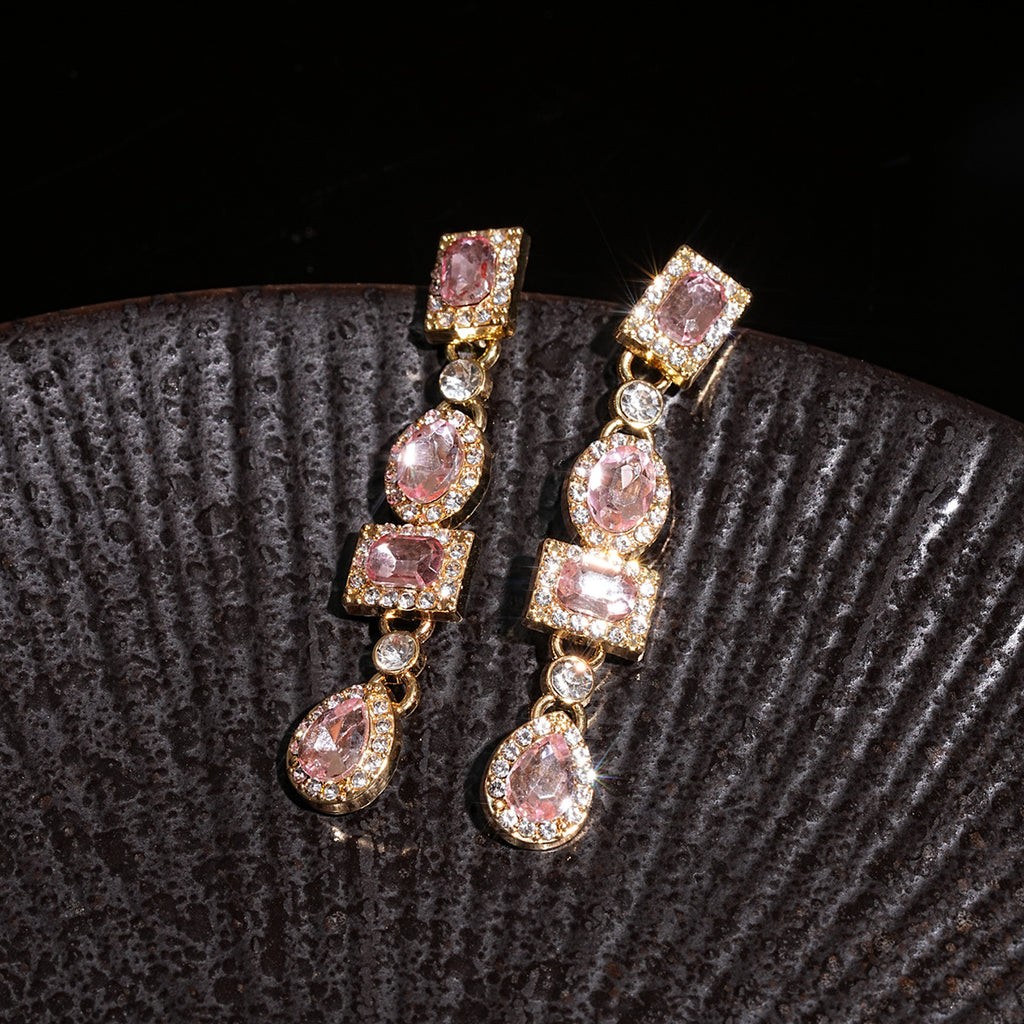 Boucles d'oreilles fleur avec perle et strass