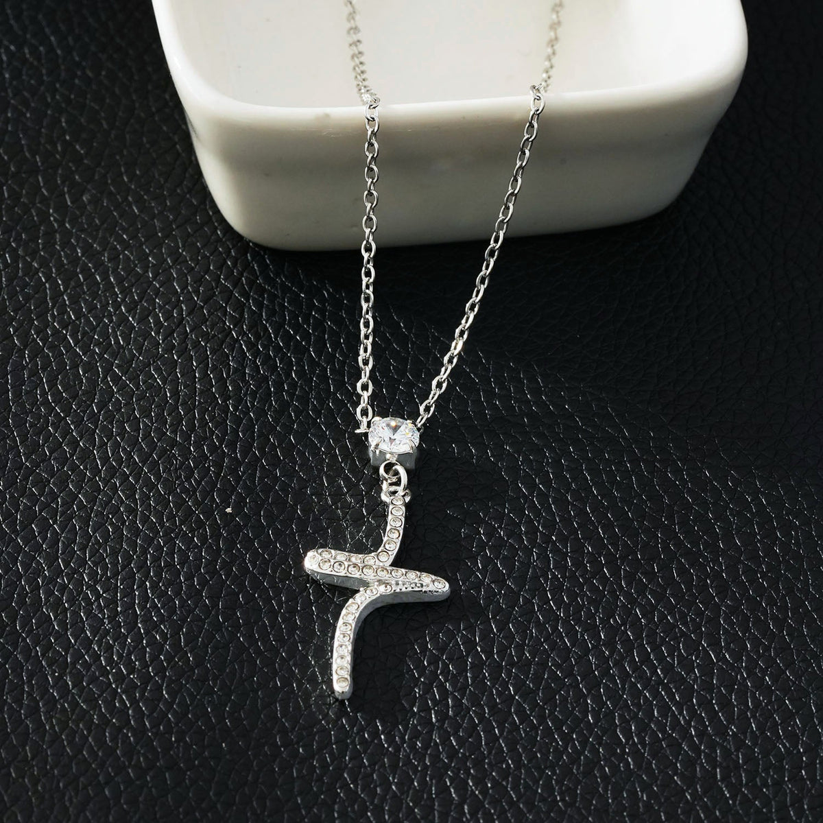 CRISTO Silver (White Gold): Dainty Chain Necklace with a Zirconia Embedded Abstract Textured Cross Pendent
