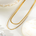 FAWZIA Or : collier 2 rangs, chaîne serpent plate et chaîne corde