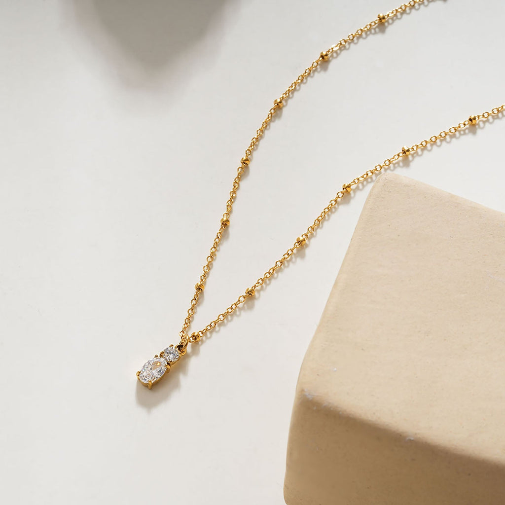 CABBANA Or : collier chaîne perlée avec duo de pendentifs en zircon