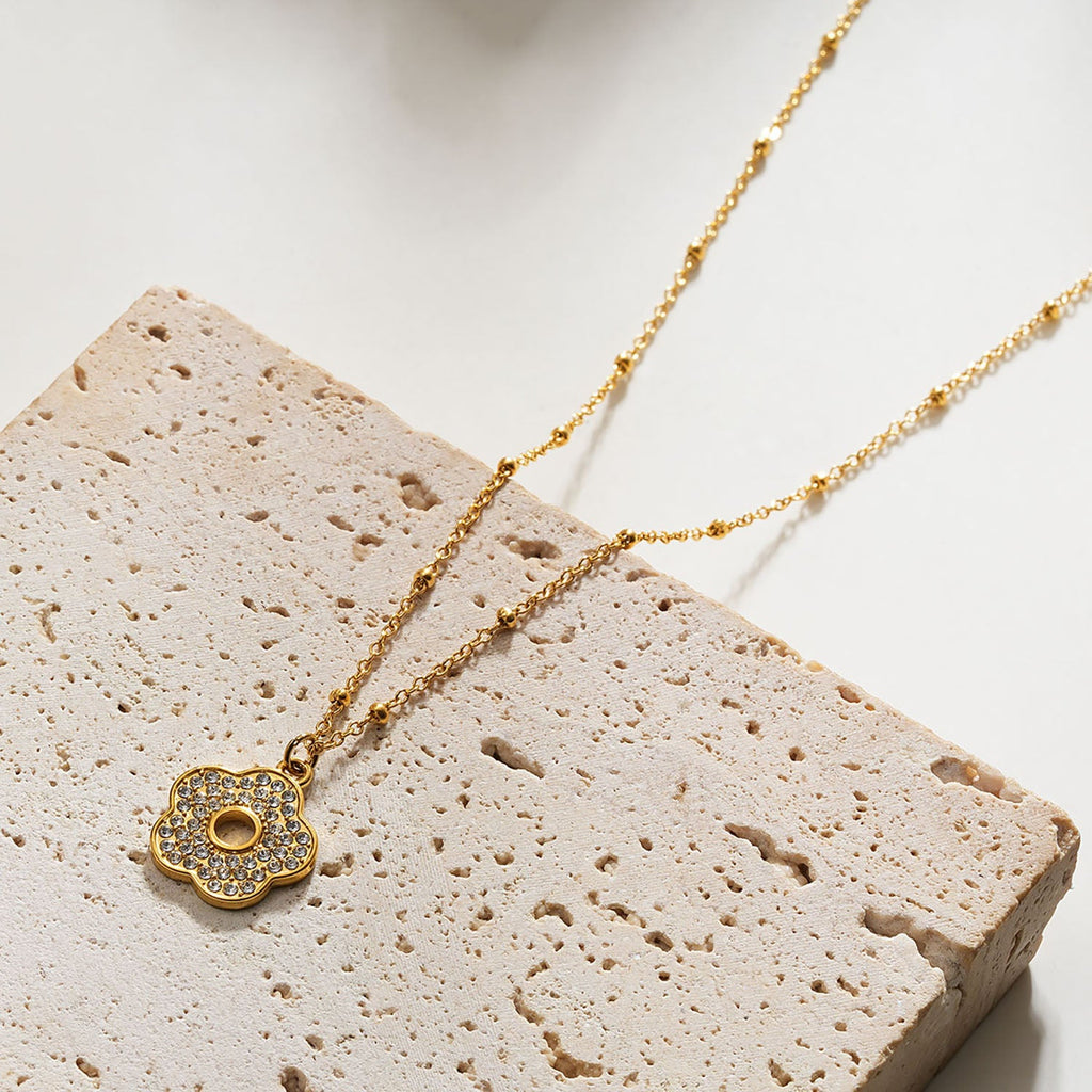 MELRINA Gold - Vintage Bloom: Beaded Chain Necklace with Pave Zirconia Flower Charm