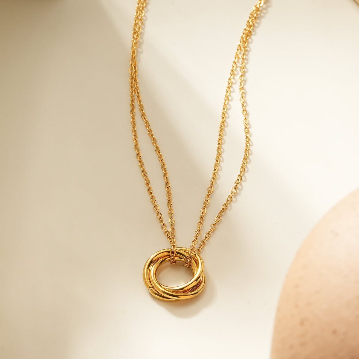 ELVIRA Or : collier délicat à double chaîne, pendentif 3 anneaux entrelacés