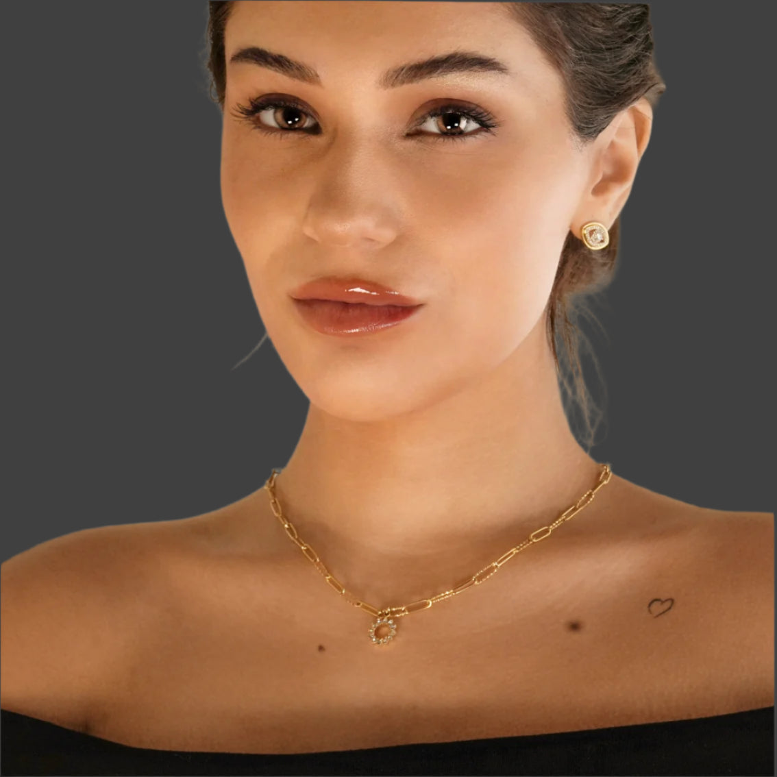 FRETTA : collier chaîne trombone dorée avec pendentif étoile en zircons
