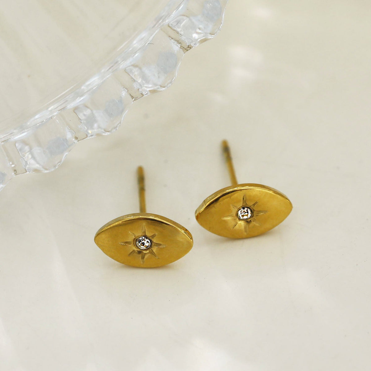 TINDRA: Oval Shaped Gold Stud Earrings Featuring a Solitaire Zirconia