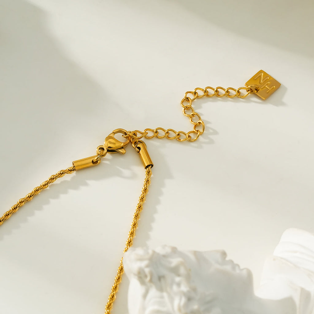 PROTACTOR Or : collier chaîne avec œil protecteur serti de zircons (CZ)