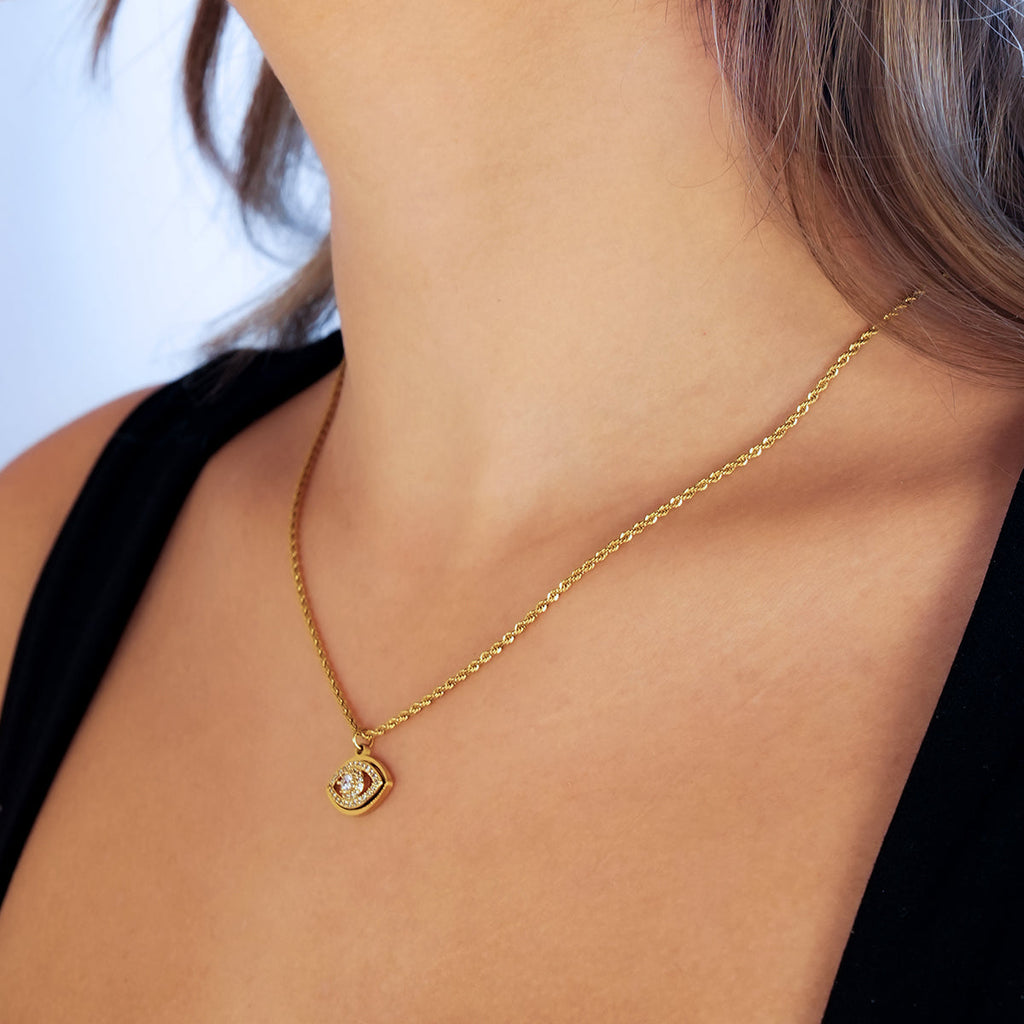 PROTACTOR Or : collier chaîne avec œil protecteur serti de zircons (CZ)