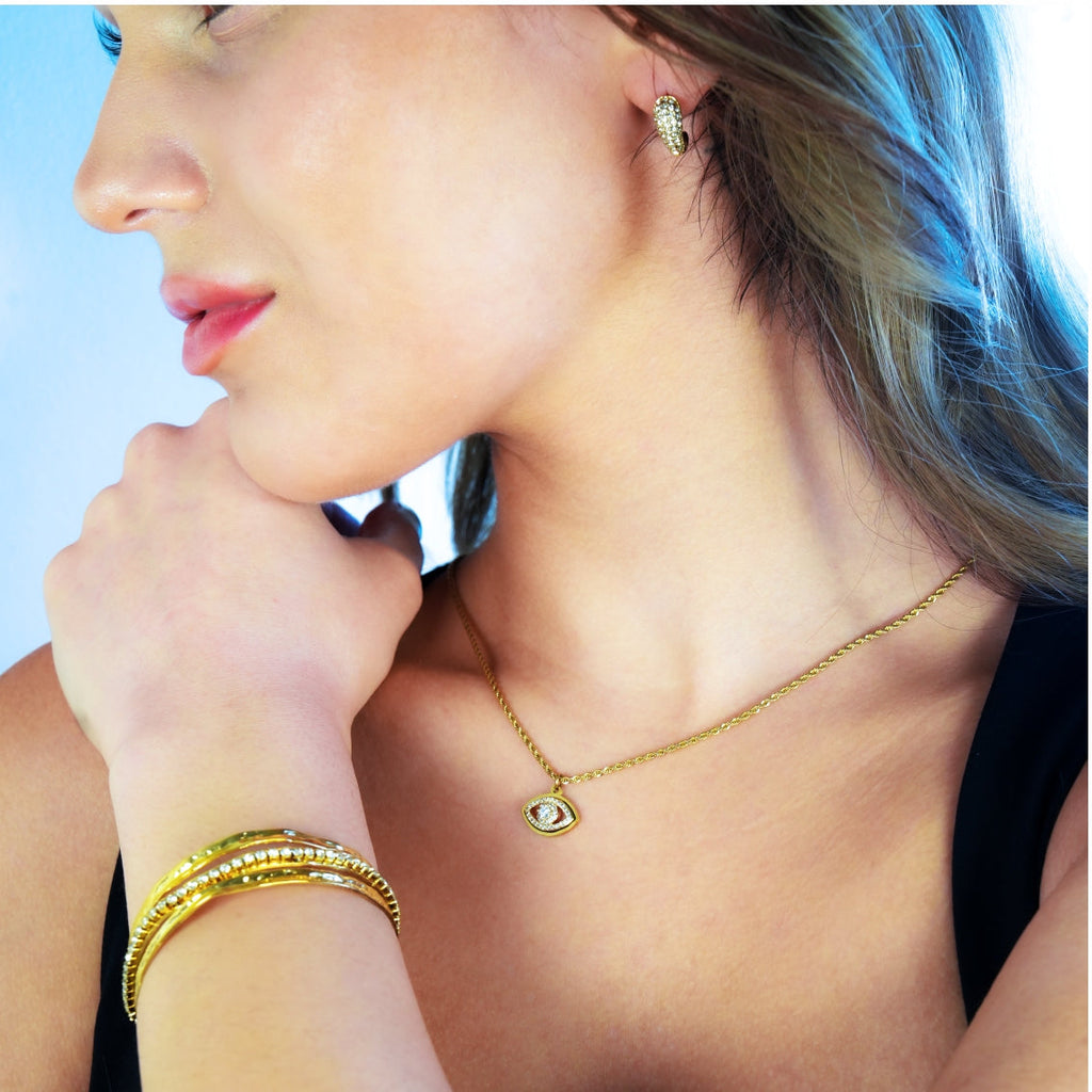 PROTACTOR Or : collier chaîne avec œil protecteur serti de zircons (CZ)