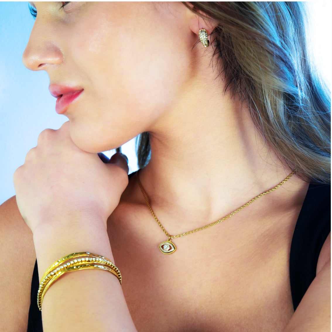 PROTACTOR Or : collier chaîne avec œil protecteur serti de zircons (CZ)