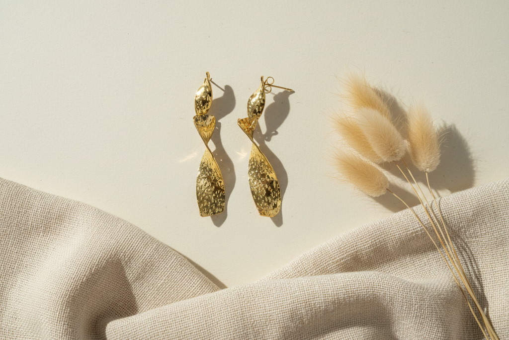 Boucles d'oreilles torsadées en acier inoxydable doré