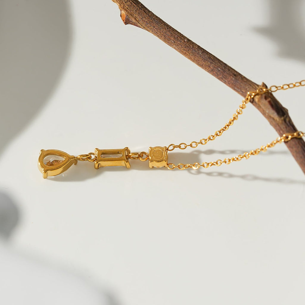 ROCHINA Or : collier chaîne avec trio de breloques en zircon