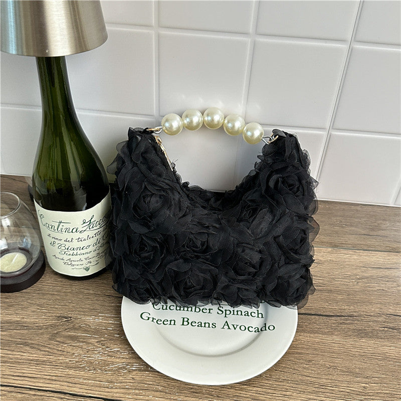 Sac à main élégant à texture perle