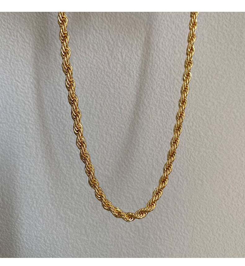 Collier chaîne torsadée dorée