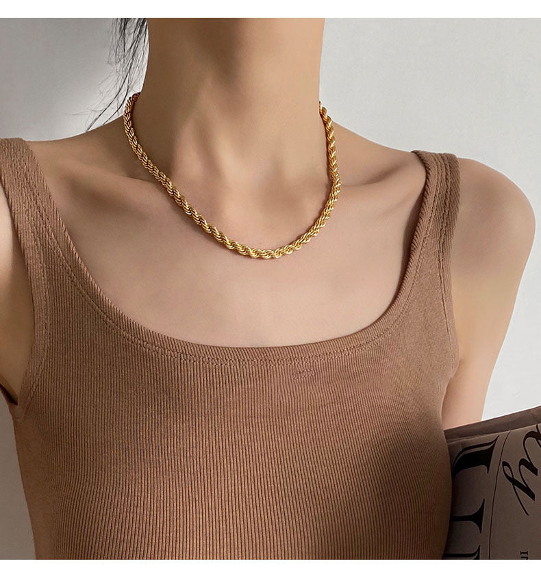 Collier chaîne torsadée dorée