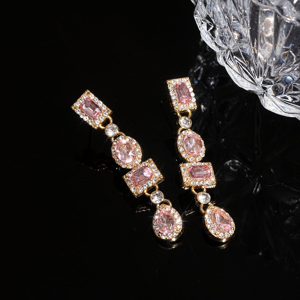 Boucles d'oreilles fleur avec perle et strass