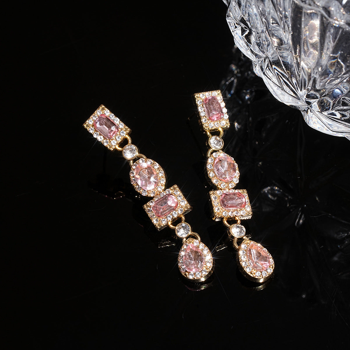 Boucles d'oreilles fleur avec perle et strass