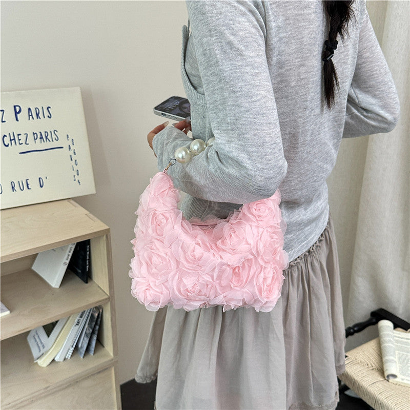 Sac à main élégant à texture perle