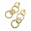 Boucles d'oreilles cercles liés en acier inoxydable doré